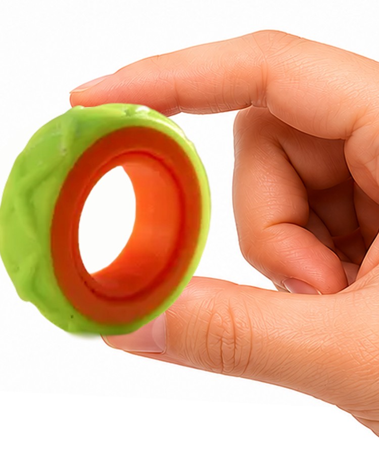 A child holding a Chrishco rotating fidget ring between two fingers